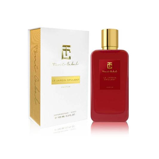 "Perfume Le Jardin Opulent de Toni Cabal con su caja blanca y dorada, aroma envolvente con flores exóticas y elegancia oriental"