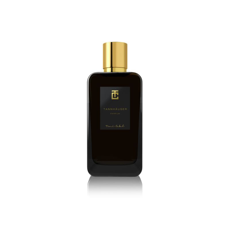 Botella de ‘Tannhäuser Parfum’ de Toni Cabal en color negro con tapón dorado, destacando un aroma intenso y elegante.