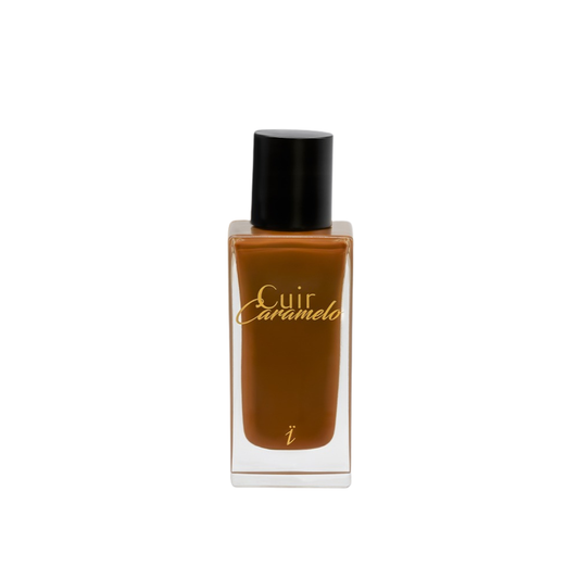 Perfume Cuir Caramelo de Yzkine en frasco ámbar con tapón negro, fragancia cálida y envolvente.