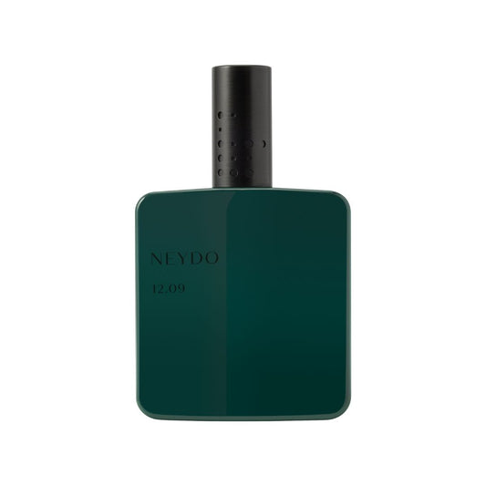 Perfume Neydo 12.09 – Fragancia profunda en frasco verde oscuro, elegancia natural.