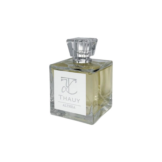 Perfume Thauy Althea, aroma delicado y elegante presentado en frasco cuadrado de lujo.