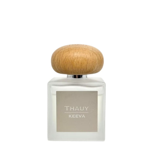"Frasco del perfume Keeva de THAUY con tapón de madera, fragancia floral almizclada para mujer de la colección The Power of Resilience"