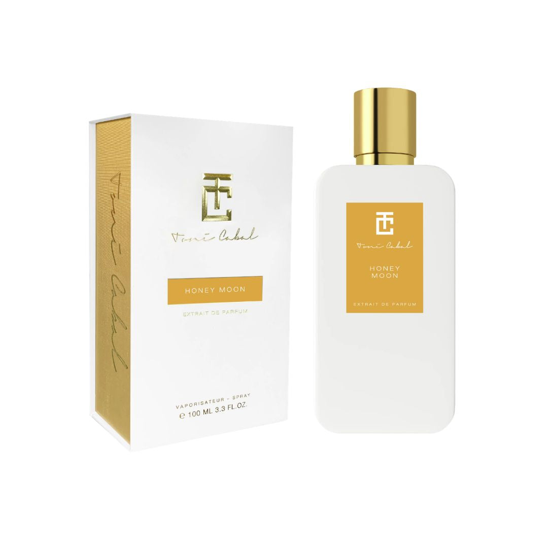 Caja y frasco del perfume Toni Cabal Honey Moon Extrait de Parfum con acabado blanco y detalles dorados.