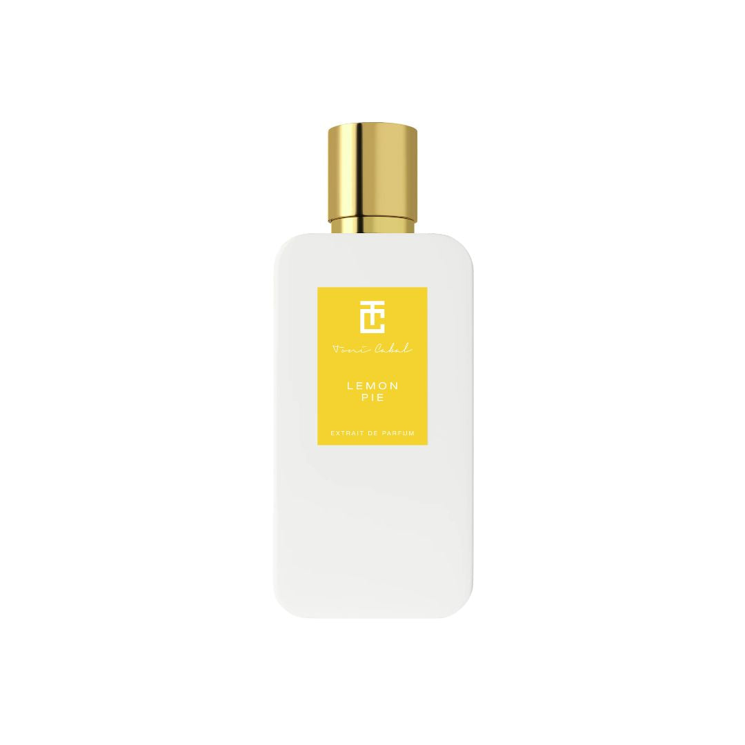 Perfume Toni Cabal Lemon Pie Extrait de Parfum en frasco blanco con etiqueta amarilla y tapón dorado.