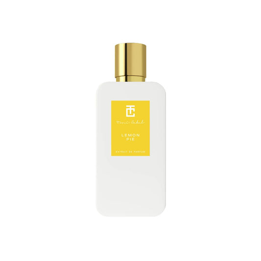 Perfume Toni Cabal Lemon Pie Extrait de Parfum en frasco blanco con etiqueta amarilla y tapón dorado.