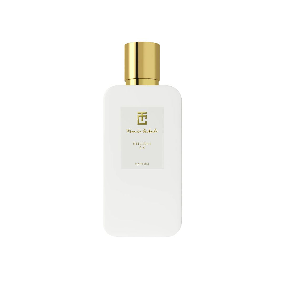 Perfume Toni Cabal Shushi 24 Parfum en frasco blanco minimalista con detalles dorados y fondo claro.