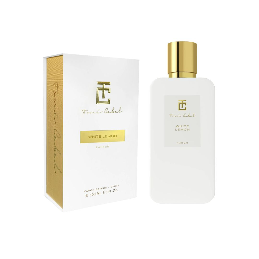Caja y frasco del perfume Toni Cabal White Lemon Parfum con diseño minimalista blanco y detalles dorados.