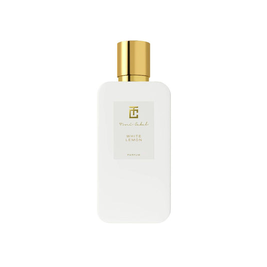 Perfume Toni Cabal White Lemon Parfum en frasco blanco elegante con tapón dorado sobre fondo neutro.